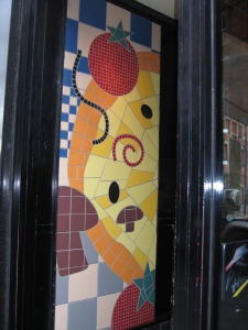 Mosaic at entrance to Pizza Hut in York, England. Photo Credit: Cathy Hanson