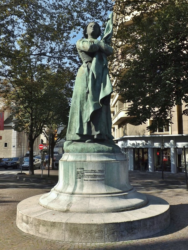 Sight, in the morning sun, of La Sasson statue (1892), in the city of Chambéry center, in Savoie, France. Author: Florian Pépellin