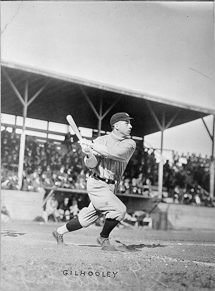 Frank Gilhooley, baseball player with the New York Yankees, swings his bat at home plate. Photo: Author Unknown via Wikimedia Commons