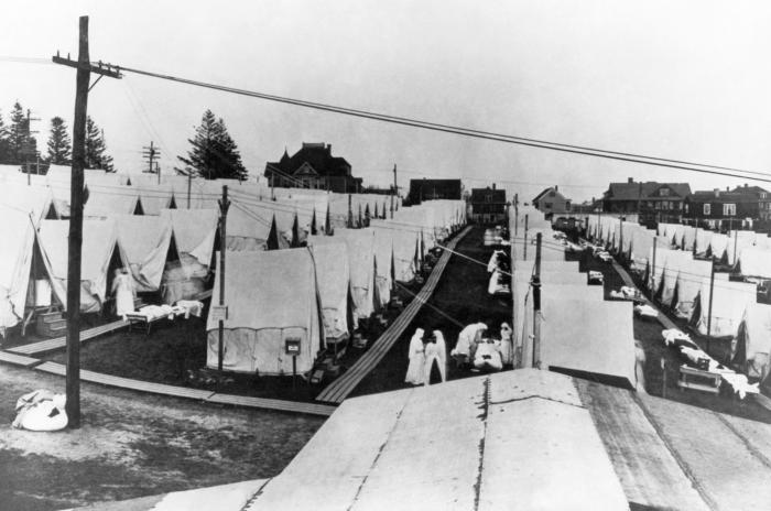 This May 29, 1919 photograph showed rows of tents that had been set up on a lawn at Emery Hill in Lawrence, Massachusetts where victims of the 1918 influenza pandemic were treated. Photo from Wikimedia Commons