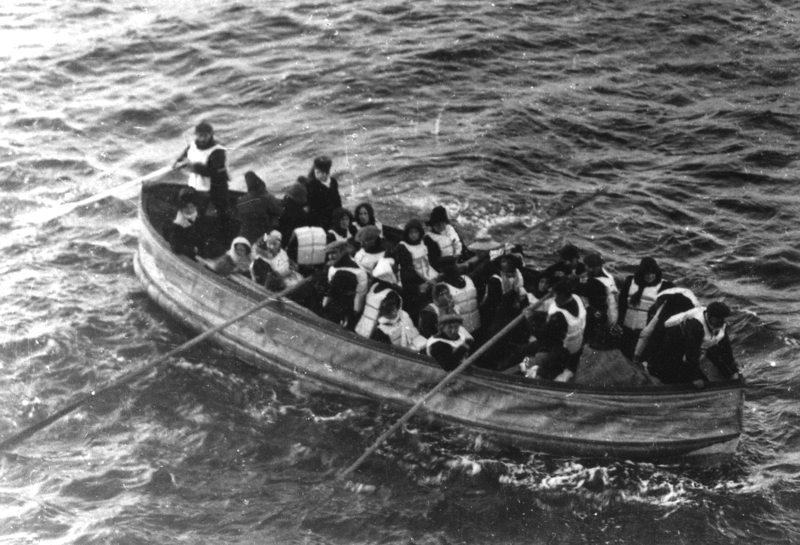 Last lifeboat arrived, filled with Titanic survivors. This photograph was taken by a passenger of the Carpathia, the ship that received the Titanic's distress signal and came to rescue the survivors. It shows the last lifeboat successfully launched from the Titanic. Photo: passenger on the Carpathia via Wikimedia Commons